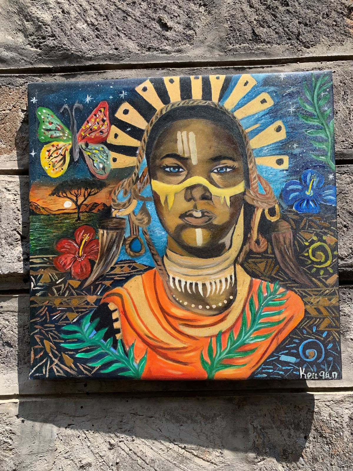 Painted portrait of a young woman with tribal markings, hibiscus and butterflies